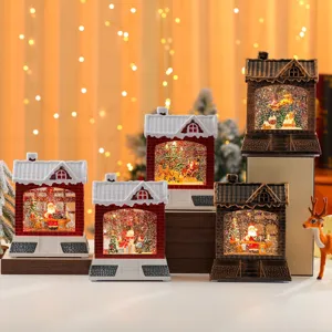 Christmas water snow globe lantern night light detail display with festive glowing scenes.