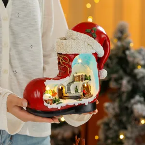 Christmas boot resin micro landscape music box with glowing lights for holiday home decor.