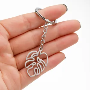 Roestvrij staal holle monstera blad hanger sleutelhanger, stijlvol metalen accessoire.