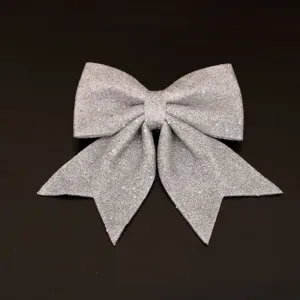 Silver glitter bow ornament for Christmas tree decor, sparkling holiday party hanging decoration.