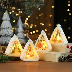 Close up of glowing triangular Christmas night lights with cute holiday print design desktop decor.