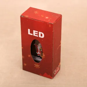 Christmas LED water wind lamp packaging box detail, red festive design with clear window.