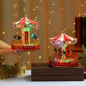Christmas glowing carousel music box detail view with colorful lights and festive red design