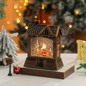 Exquisite Christmas snow globe lantern detail showcasing Santa Claus inside with swirling glitter.