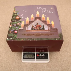Caja de embalaje de lámpara de vela caja de música bola de nieve de Navidad regalo