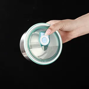 Stainless steel baby bowl with sealing lid and timer valve for steaming food safely.