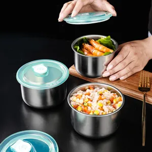 Stainless steel insulated bowl with airtight silicone lid for food storage and baby rice.