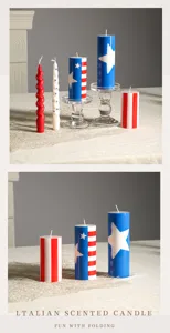 Scented pillar and spiral candles with patriotic star and stripe designs for holiday decor.