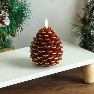 Vue detaillee bougie electronique LED pomme de pin Noel, superbe accessoire decoratif festif.