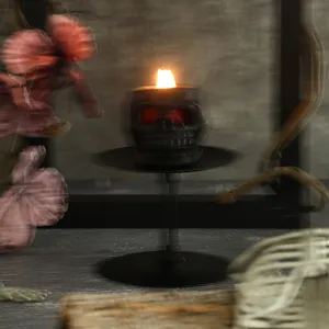 Αξεσουάρ κεριού κρανίου Halloween, ρετρό τρομακτικό μαύρο σχέδιο με λαμπερά κόκκινα μάτια.