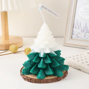 Handcrafted Christmas tree scented candle with wood slice base, natural wax home decor detail.
