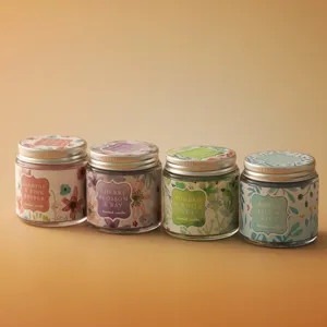 Scented candle gift set in glass jars with floral labels, perfect for home decor and cozy ambiance.