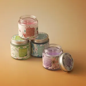 Detail shot of scented candle in glass jar with floral label, cozy home decor fragrance.