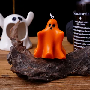 Bougie parfumée fantôme d'Halloween cire orange artisanale déco maison accessoire photo