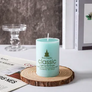 Candela cilindrica profumata in cera di soja accessorio foto casa decorazione scrivania blu