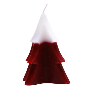 Candela profumata albero di Natale, cera rossa e bianca decorazione natalizia e oggetti di scena.