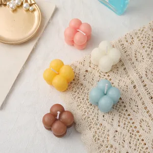 Detail view of colorful cute bubble scented candles set, sweet aesthetic room decor and props.