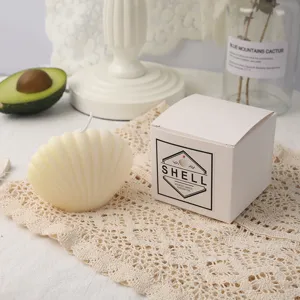 Exquisite seashell scented soy wax candle with elegant gift box for home decor and gifts.