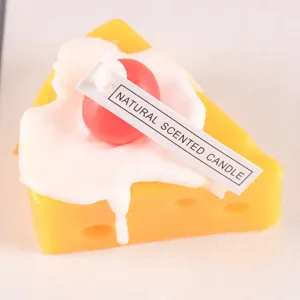 Cheese shape scented soy candle with cherry decor, handmade decorative wax candle for home.
