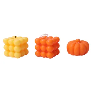Set of 3 aesthetic bubble cube and pumpkin scented soy candles for home decor and gifts.
