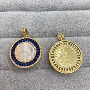Round pendant detail showing blue zircon, white mother-of-pearl portrait, and carved back.