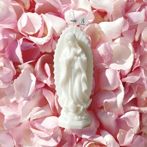 Scented candle with prayer figure design, white wax home decor and creative romantic gift.