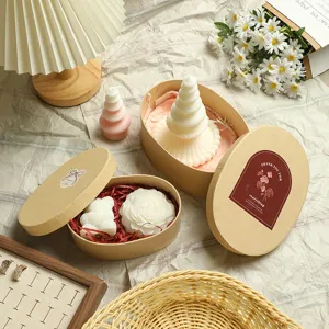 Scented candle gift set featuring tree, rose and bear shapes in kraft boxes with warm decor.