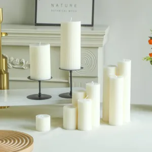 White Nordic striped pillar scented candles set, decorative wax for home and wedding decor.