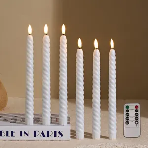 Set of 6 white twist LED taper candles with remote control for home decor festival party lighting.