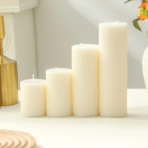 Detailed view of Nordic style ribbed white pillar scented candles set for home decor and gifts.