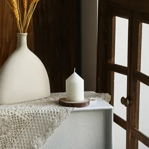 Nordic minimalist white striped pointed pillar candle, aesthetic geometric aroma candle decor.