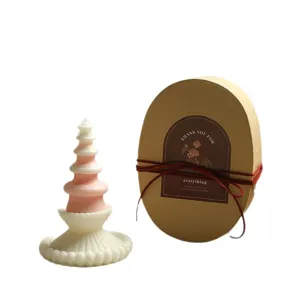 Exquisite layered scented candle gift set with pink and white design, perfect for home decor.