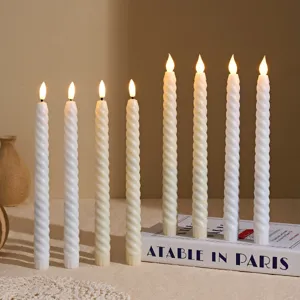 Set of 8 white twisted LED taper candles, perfect for home decor, weddings and party lighting.