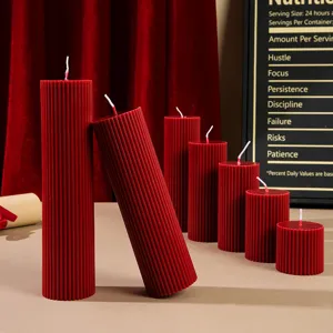 Red striped pillar scented soy wax candle for home decor, Christmas party and cozy ambiance.