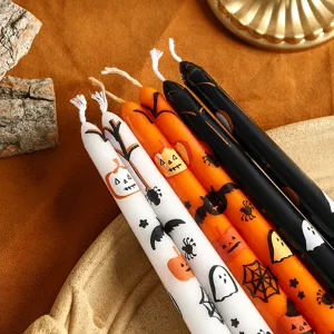 Halloween scented taper candles set with cute pumpkin and ghost print for party decor main view.