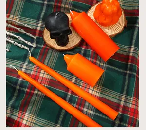 Halloween candle set featuring skull, pumpkin, and taper candles for festive party decor.
