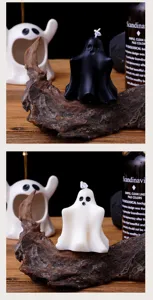 Halloween ghost scented candle detail shot, spooky home decor, black and white holiday gift.