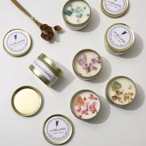 Gold vintage tin scented candles with dried flowers, natural soy wax, relaxing home decor gift.