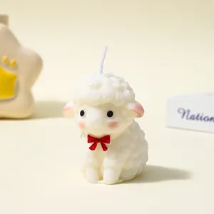 Cute white sheep scented candle with a red bow, soy wax handmade candle for home decor.