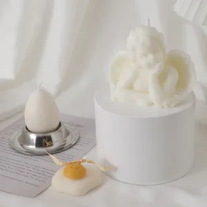 Exquisite soy wax scented candle featuring cute angel and fried egg designs for home decor.