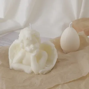Handmade soy wax angel scented candle aesthetic home decor photography prop and egg candle.
