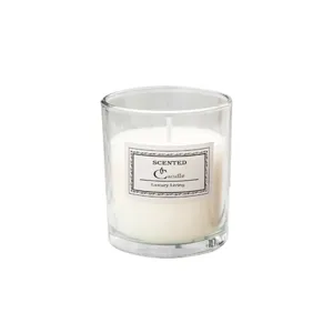 Scented candle in transparent glass jar, white soy wax aromatherapy candle for home decor.