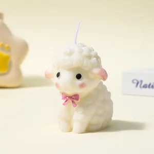 Cute sheep scented soy wax candle with pink bow for cozy home decor and gift setup detail view.