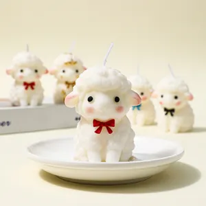 Cute sheep soy wax aromatherapy candle with red bow, ideal for cozy home and room decor.