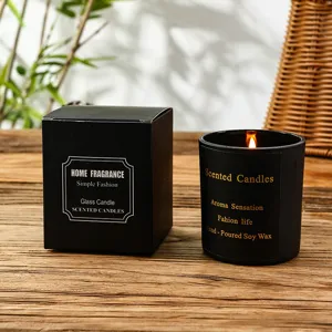 Retro black scented candle in glass jar with gift box, romantic home decor fragrance.