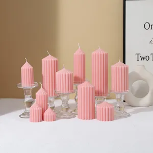 Pink striped pillar scented candles set, minimalist home decor mood arrangement props.