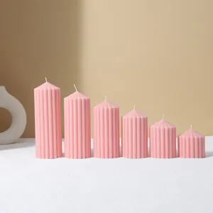 Pink striped pillar scented candles set, decorative wax candles for home decor and cozy ambiance.
