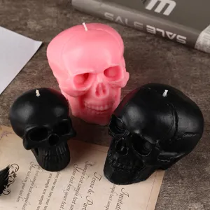 Halloween Totenkopf Duftkerzen Set, gotische Wachskerzen in Rosa und Schwarz fur Grusel.