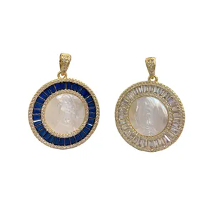 Round mother of pearl Virgin Mary pendant with blue and white zirconia for women fashion jewelry.