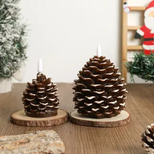 Christmas pinecone LED candle light, painted paraffin wax decorative atmosphere prop detail.